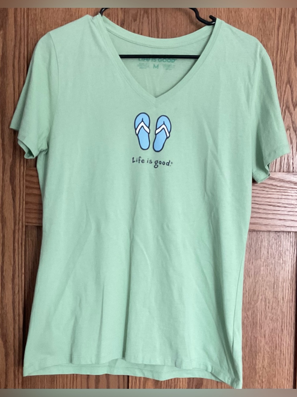Life Is Good Women's Light Green V-Neck Tee with Blue Flip Flop Graphic